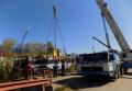 Спуск на воду коробля и барж на Уткином проспекте в Санкт-Петербурге