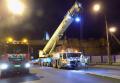 Монтаж балки моста в Питере краном